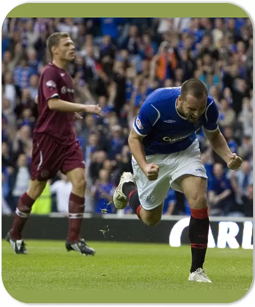 Rangers Kris Boyd: Double Delight - Celebrating Goal Number Two Against Hearts at Ibrox Stadium
