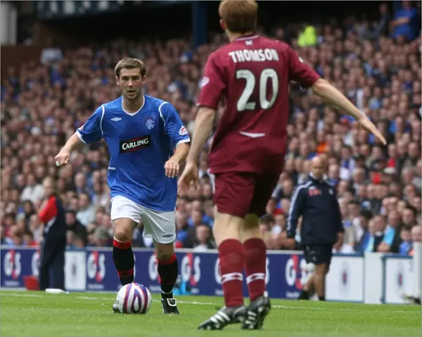 Ibrox Rivalry: Thomson Brothers Face Off in Rangers 2-0 Clydesdale Bank Premier League Triumph