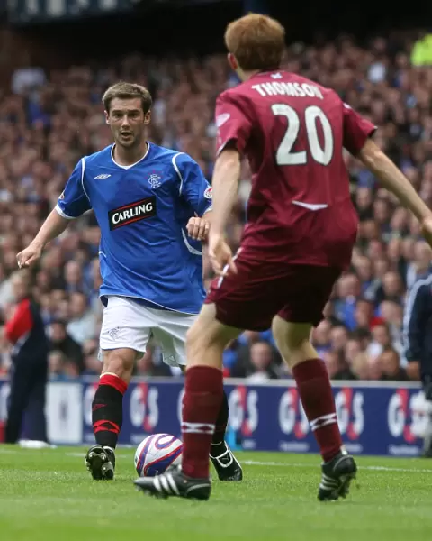 Ibrox Showdown: Rangers vs. Heart of Midlothian - Thomson Siblings Face Off as Rangers Lead 2-0