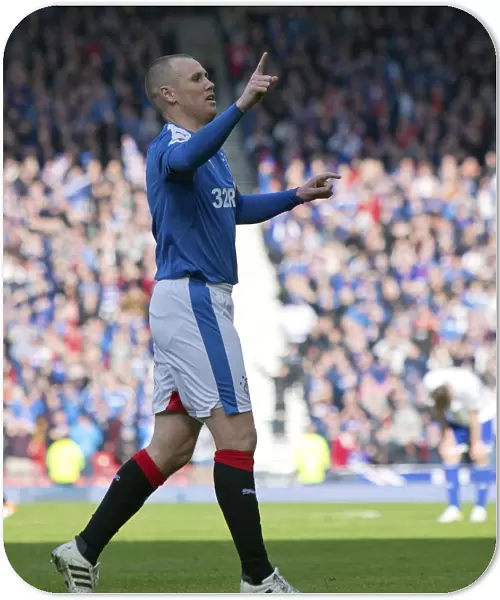 Rangers FC's Euphoric Moment: Kenny Miller's Goal Celebration in Petrofac Training Cup Final Victory over Peterhead (2003)