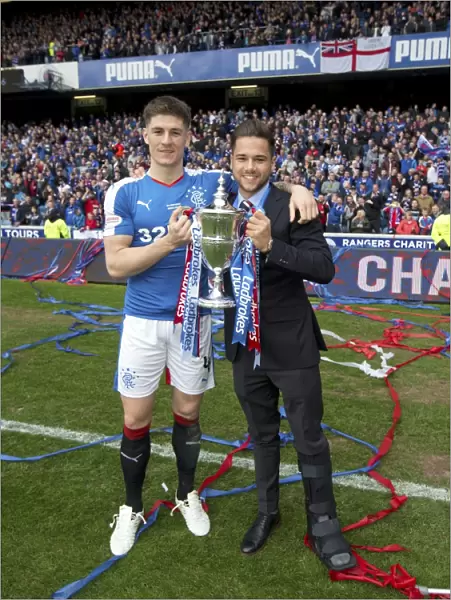 Rangers Football Club: Rob Kiernan and Harry Forrester Celebrate Championship Victory with the Ladbrokes Trophy at Ibrox Stadium