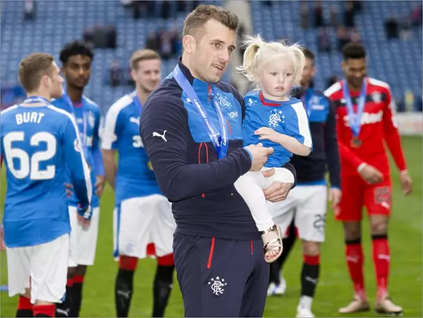 Rangers Football Club: Cammy Bell and Daughter Rejoice in Ladbrokes Championship Victory at Ibrox Stadium