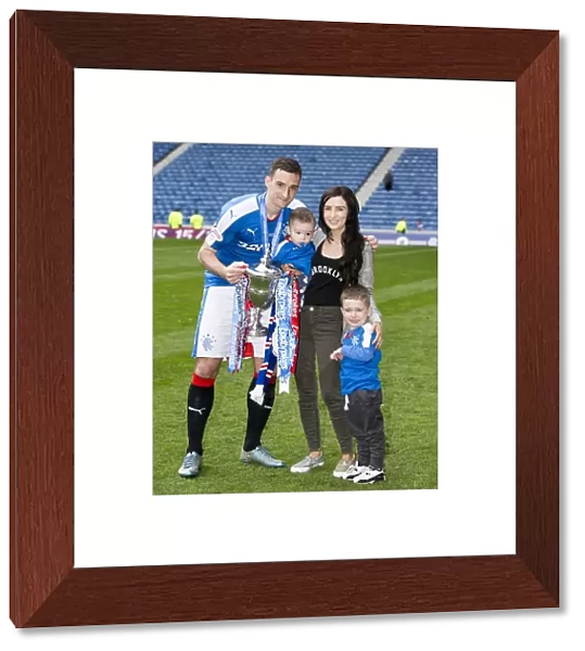 Rangers Football Club: Lee Wallace and Family Celebrate Championship Victory with the Trophy at Ibrox Stadium