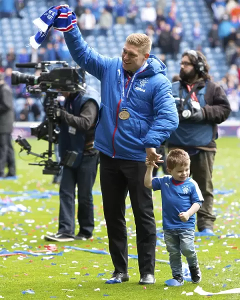 Rangers Football Club: Martyn Waghorn and Son Ruben Celebrate Championship Victory at Ibrox Stadium