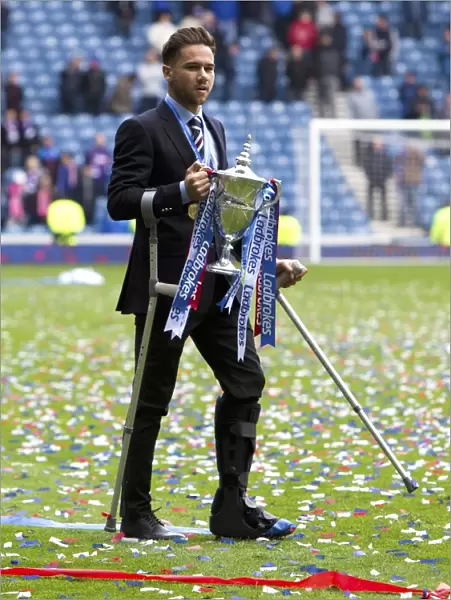 Harry Forrester's Championship Triumph: Celebrating with the Ladbrokes Trophy at Ibrox Stadium