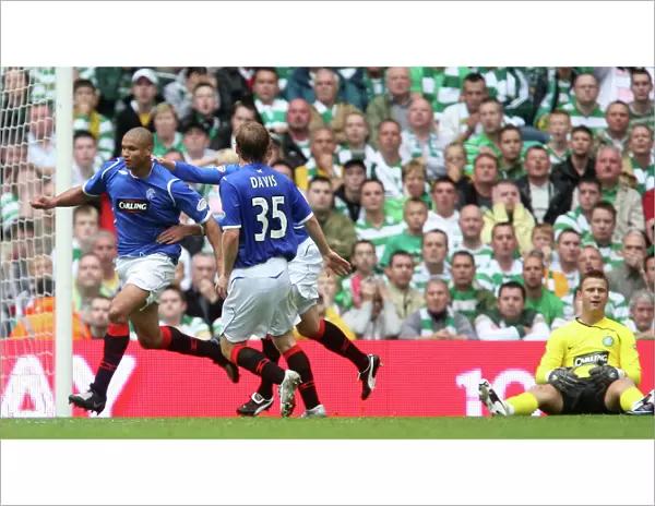 Daniel Cousin's Thrilling Opener: Rangers Stun Celtic in SPL Clash