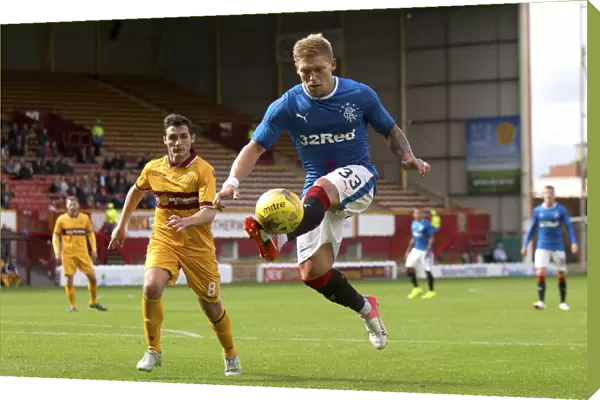 Intense Rivalry: Waghorn vs. McHugh Clash in Motherwell vs. Rangers Betfred Cup Match