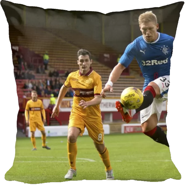 Intense Rivalry: Waghorn vs. McHugh Clash in Motherwell vs. Rangers Betfred Cup Match