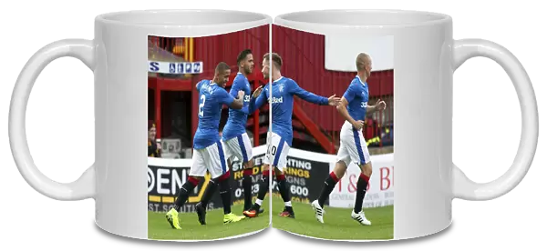 Rangers Tavernier and McKay: A Celebratory Moment in the Betfred Cup Match against Motherwell