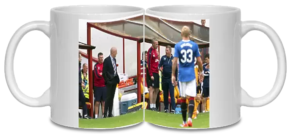 Intense Rivalry: Weir and McGhee's Heated Exchange on the Rangers-Motherwell Touchline