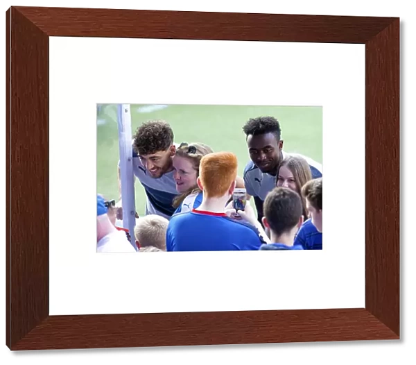 Rangers Football Club: Joe Dodoo and Matt Crooks Connecting with Enthusiastic Fans at Ibrox Stadium