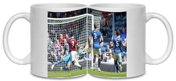 Andre Gray Scores His Second Penalty for Burnley at Ibrox Stadium