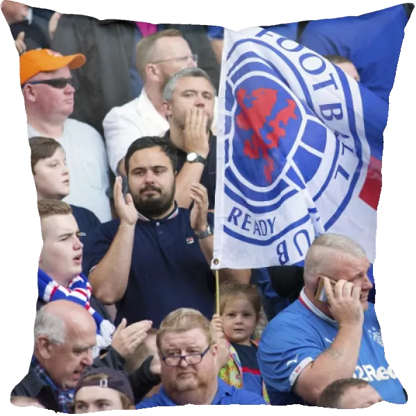 Euphoric Rangers Fans: Celebrating a Hard-Fought Victory Against Hamilton Academical in the Ladbrokes Premiership at Ibrox Stadium