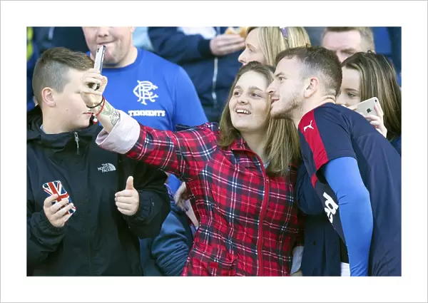 Rangers Andy Halliday and Fan: A Selfie Moment at Ibrox Stadium (Scottish Betfred Cup)
