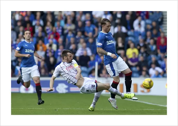 Rangers vs Ross County: Joe Garner vs Paul Quinn - Intense Moment in the Ladbrokes Premiership at Ibrox Stadium