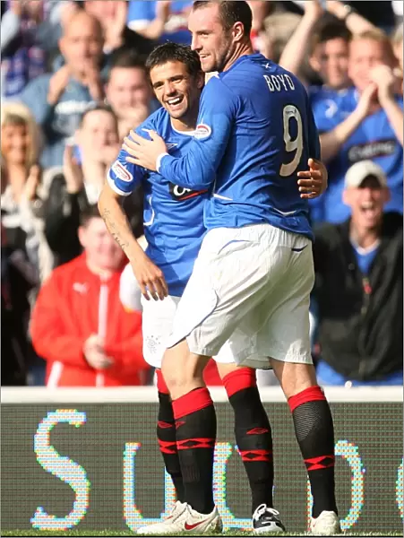 Rangers Football Club: Kris Boyd and Nacho Novo's Unforgettable Moment - Celebrating the Second Goal Against Motherwell at Ibrox