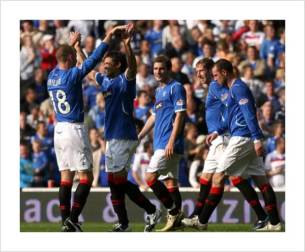 Rangers Football Club: Miller and Novo Celebrate Second Goal Against Motherwell in SPL Clydesdale Bank Match at Ibrox