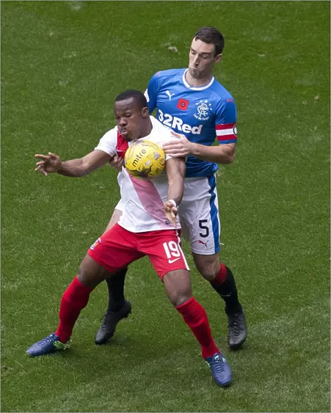 Intense Rivalry: Lee Wallace vs Souleymane Coulibaly - A Battle to Remember at Ibrox Stadium