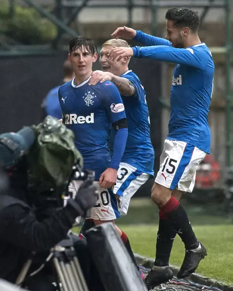 Rangers Emerson Hyndman Scores and Celebrates with Team Mates in Motherwell Victory