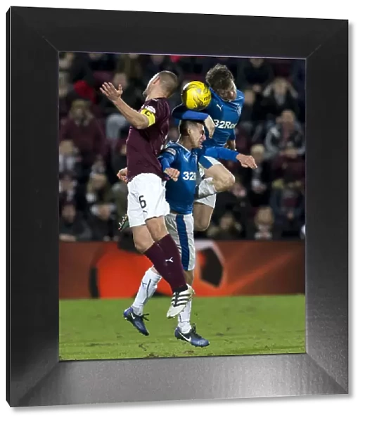 Rangers vs Hearts: Thrilling Moment of Clash - Players Leap in the Air