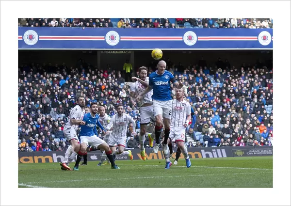 Philippe Senderos Attempts a Headered Goal: Rangers vs Ross County, Ladbrokes Premiership at Ibrox Stadium