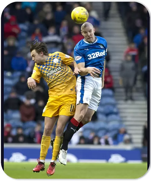 Rangers Philippe Senderos Secures the Ball Against Greenock Morton in Scottish Cup Fifth Round at Ibrox Stadium
