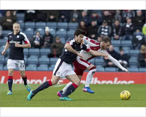 Rangers Joe Garner Battles Past Dundee's Julen Etxabeguren in Intense Ladbrokes Premiership Showdown