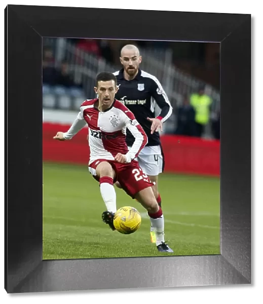 Rangers Jason Holt in Action at Dens Park: A Battle in the Ladbrokes Premiership