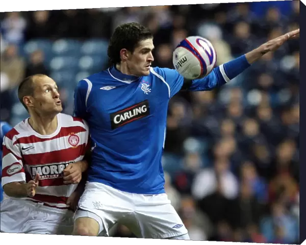 Determined Kyle Lafferty Stands Firm Against Alex Neil in Rangers 2-0 CIS Insurance Cup Victory
