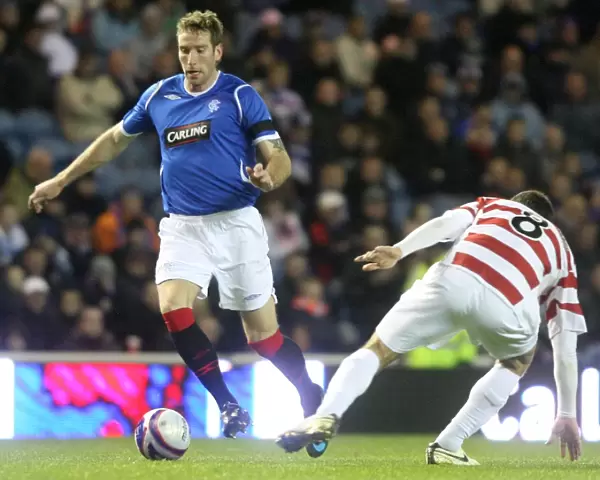 Rangers Kirk Broadfoot Scores the Decisive Goal: Rangers 2-0 Hamilton Academical in Co-operative Insurance Cup