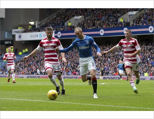 Rangers Kenny Miller Chases Down the Ball in Intense Ladbrokes Premiership Action at Ibrox Stadium