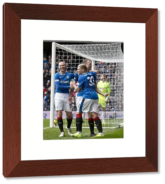 Rangers: Hill, Miller, and Waghorn's Triumphant Goal Celebration in Ibrox Stadium