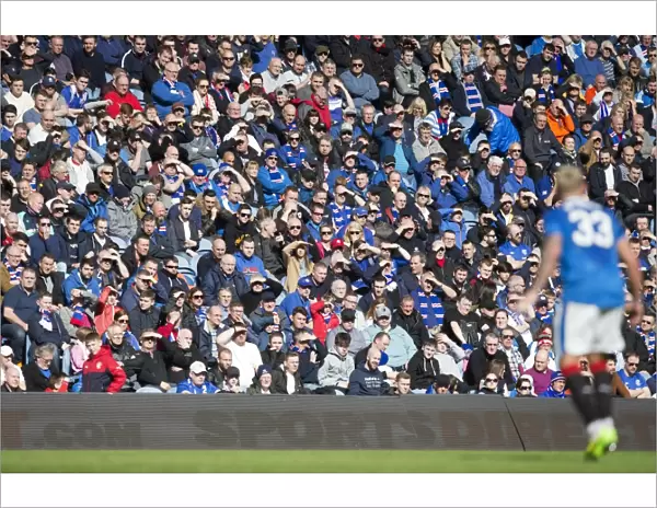 Rangers Fans Enjoy Sunny Day at Ibrox Stadium during Premiership Match vs Motherwell
