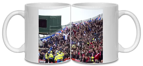 Rangers Fans Triumphant Celebration at Pittodrie Stadium
