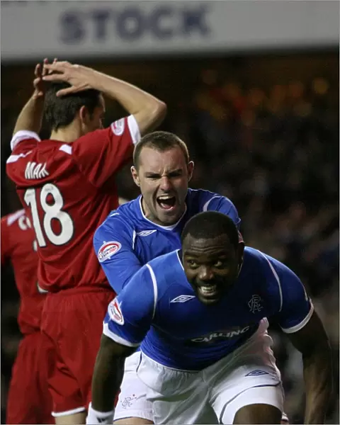 Rangers Darcheville and Boyd: Celebrating a 2-0 Goal Against Aberdeen in the Clydesdale Bank Premier League