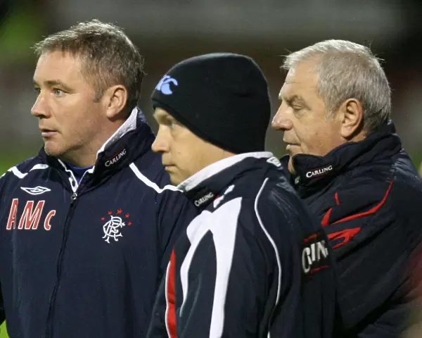 Rangers Triumvirate: McCoist, McDowall, and Smith Secure 0-0 Draw Against Motherwell in the Clydesdale Bank Premier League