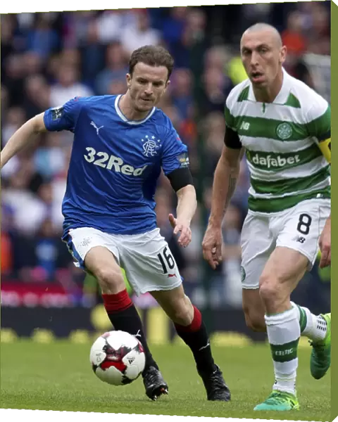 Intense Rivalry: Rangers Andy Halliday Chases Scott Brown in the Scottish Cup Semi-Final at Hampden Park