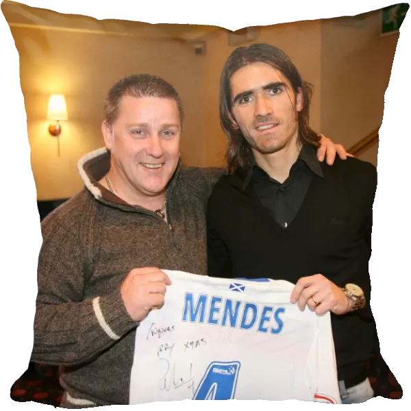 A Special Moment: Pedro Mendes Honors a Rangers FC Fan with a Prize at the Charity Race Night (2008)