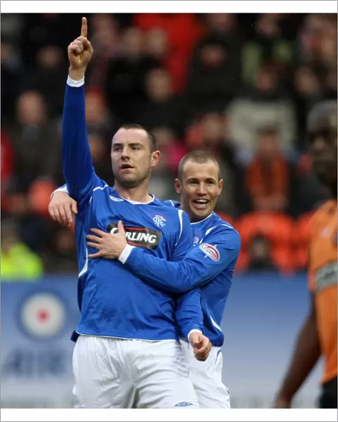 Kris Boyd's Double Strike and Epic Celebration: A Memorable Moment in Rangers vs. Dundee United (2-2), Clydesdale Bank Premier League