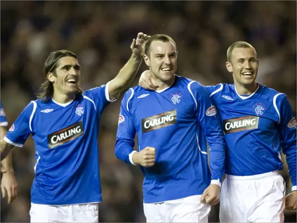 Kris Boyd's Euphoric Moment: Rangers Thrilling 1-0 Win Against Hibernian in the Clydesdale Bank Premier League at Ibrox