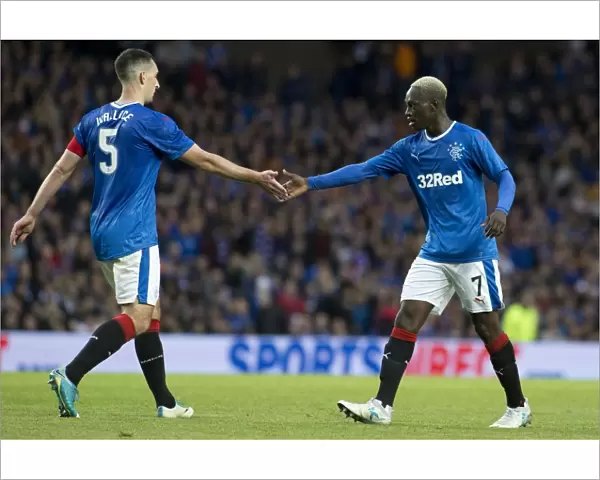 Rangers Captains Wallace and Dalcio in Europa League Action at Ibrox Stadium