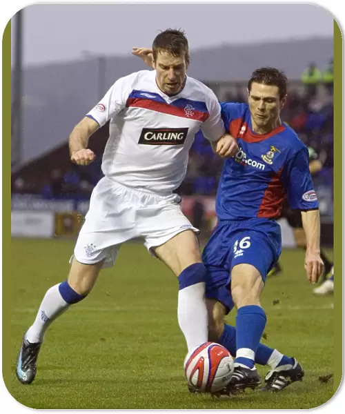 Rangers Kirk Broadfoot Tackled by Inverness Richard Hastings in Clydesdale Bank Premier League Match (Rangers 3-0 Inverness)