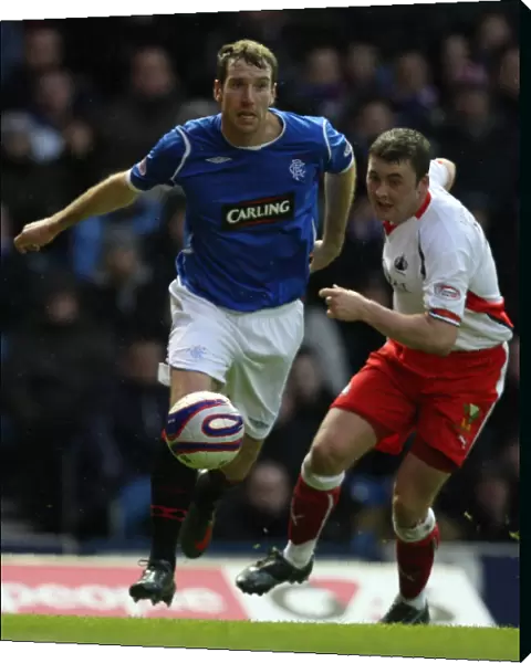 Rangers Kirk Broadfoot Celebrates Glory: 3-1 Win Over Falkirk in Clydesdale Bank Premier League