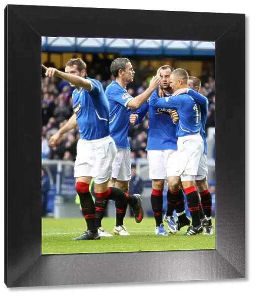 Rangers Triumph: Kris Boyd's Unforgettable Goal Celebration with Kenny Miller and David Weir (3-1 vs Kilmarnock, Clydesdale Bank Premier League, Ibrox)