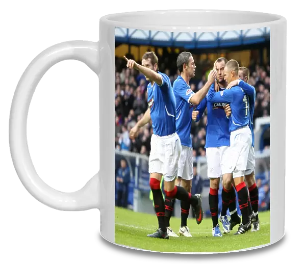 Rangers Triumph: Kris Boyd's Unforgettable Goal Celebration with Kenny Miller and David Weir (3-1 vs Kilmarnock, Clydesdale Bank Premier League, Ibrox)
