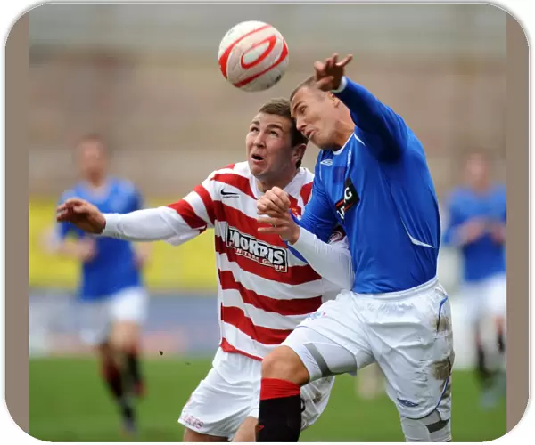 McArthur and Miller in Action: Rangers Win Against Hamilton (1-0) in the Scottish Premier League