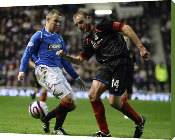 A Pivotal Moment: Kenny Miller vs Grant Munro in the Clydesdale Bank Premier League Clash at Ibrox (1-0 in Favor of Inverness)