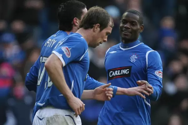 Rangers Football Club: Kyle Lafferty's Double Strike - A Glorious 5-1 Homecoming in the Scottish Cup Quarterfinals vs Hamilton (Maurice Edu's Jubilant Celebration)