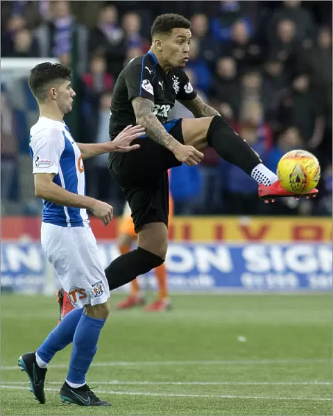 Rangers James Tavernier Secures the Ball in Intense Ladbrokes Premiership Clash at Kilmarnock