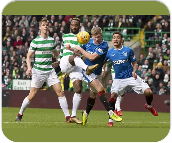 Intense Rivalry: McCrorie vs. Dembele Battle at Celtic Park, Ladbrokes Premiership